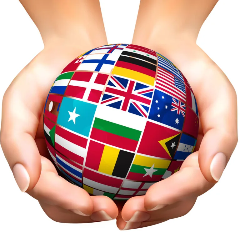 Flags of the world in globe and hand. vector illustration.